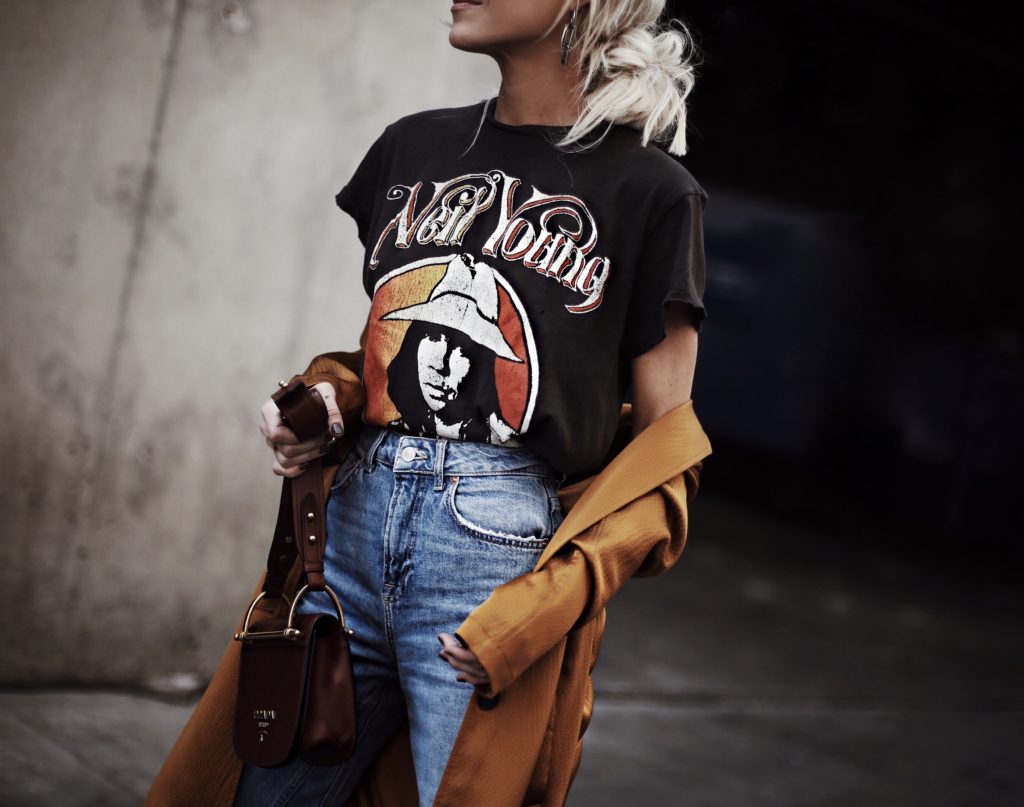 blonde girl black neil young tee