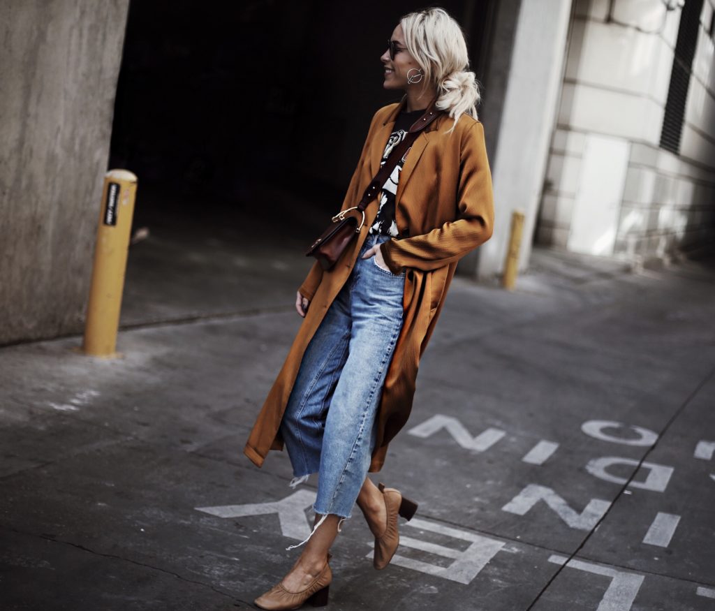 blonde girl streetstyle gold long coat prada