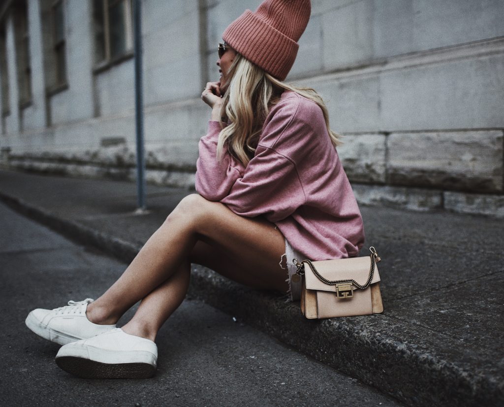 girl in street pink skirt 