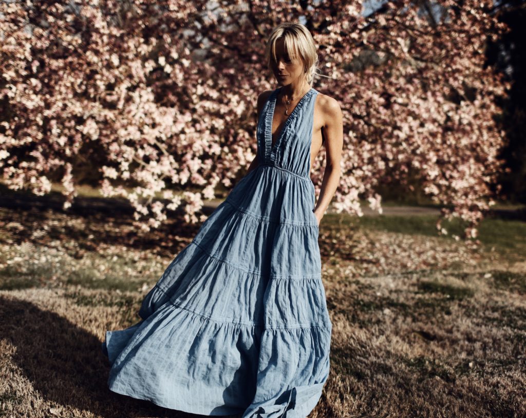 blue dress in a field 